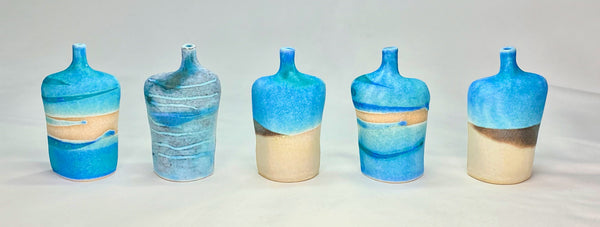 fine stoneware figurative bottles turquoise and blue glaze