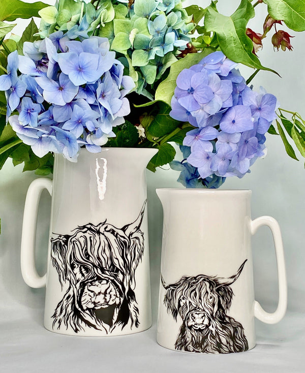 white bone china jugs with stylised highland cow design