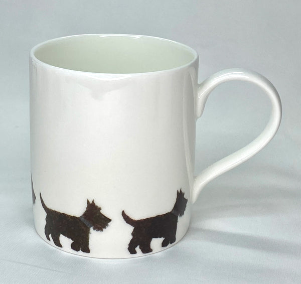 White bone china mug with black Scottie dog pattern around bottom edge