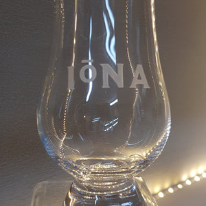 Glencairn crystal whisky glass engraved with the word Iona and the St Columba Iona halo