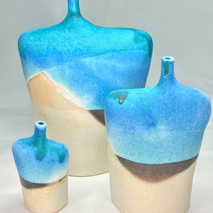 3 figurative stoneware bottles small medium large with turqouise brown and white glaze in an abstract landscape design