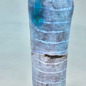 Fine stoneware figurative bottle tall slender tracks design blue glaze