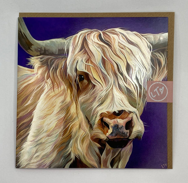 Greetings card with stylised image of a white highland cow on blue background