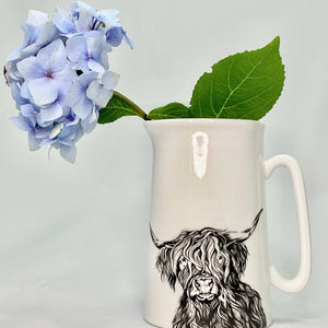 White bone china 1 pint jug with stylised highland cow image