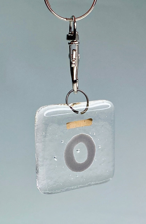 Square fused glass halo design keyring with liquid gold halo