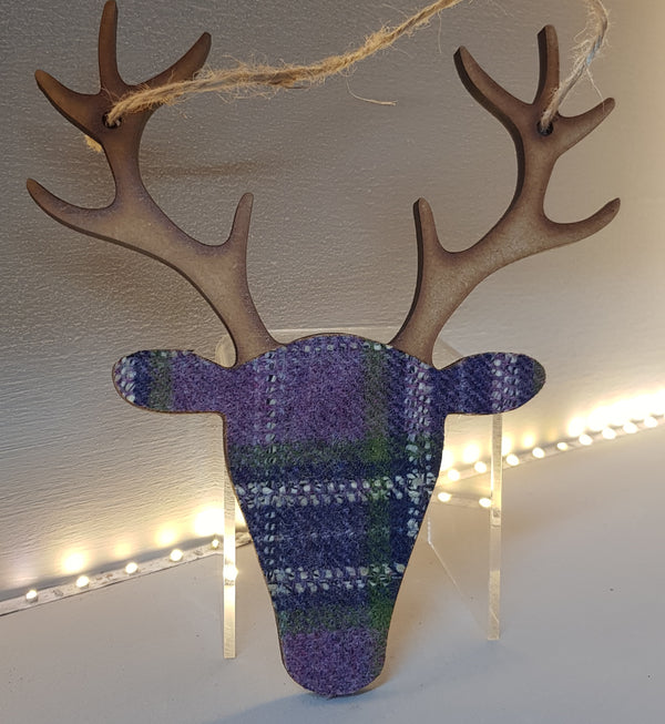 stag head decoration wood and tartan in purples