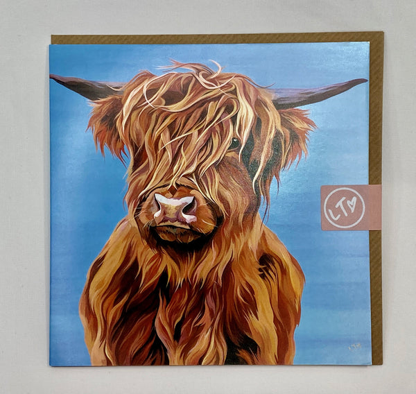 Greetings card with stylised image of a highland cow on pale blue background